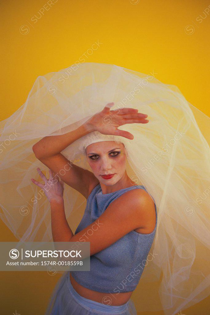 Stock Photo: 1574R-0018559B Portrait of a young woman wearing a veil