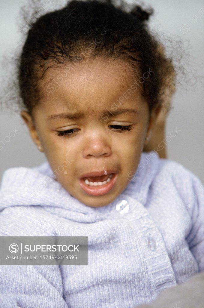 Stock Photo: 1574R-0018595 Close-up of a girl crying
