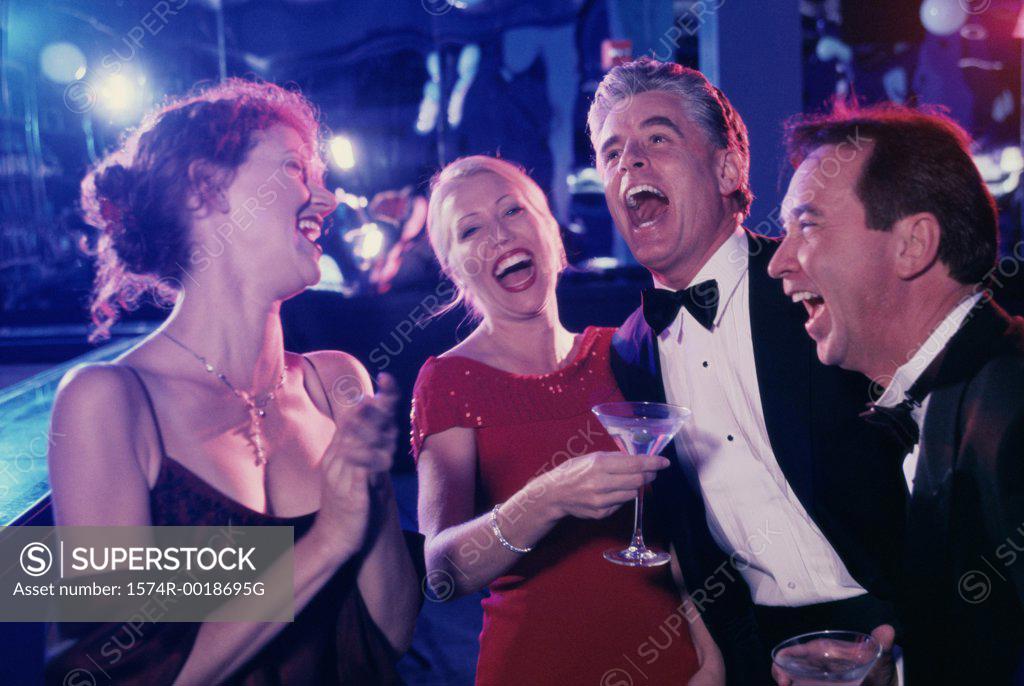 Stock Photo: 1574R-0018695G Two couples laughing