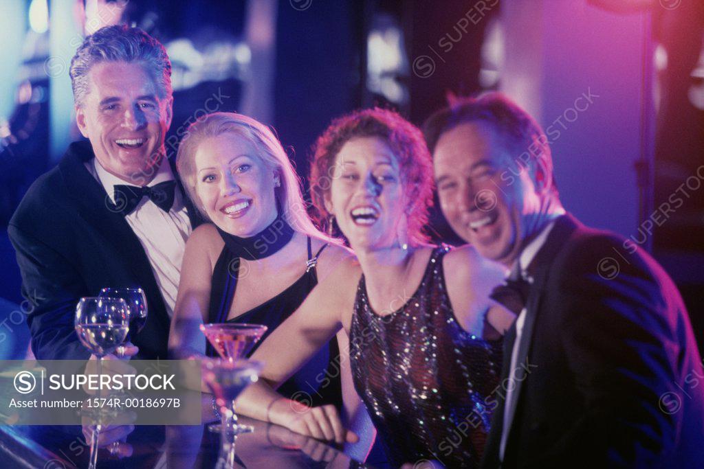 Stock Photo: 1574R-0018697B Portrait of two couples with wine glasses