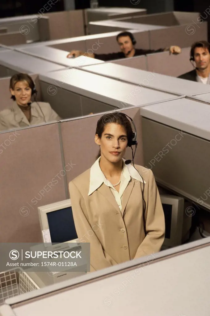 Portrait of customer service representatives in cubicles