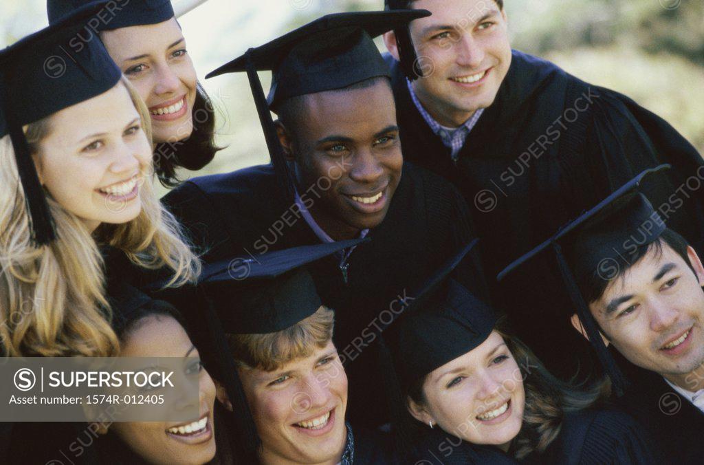 Stock Photo: 1574R-012405 High angle view of a group of young graduates smiling