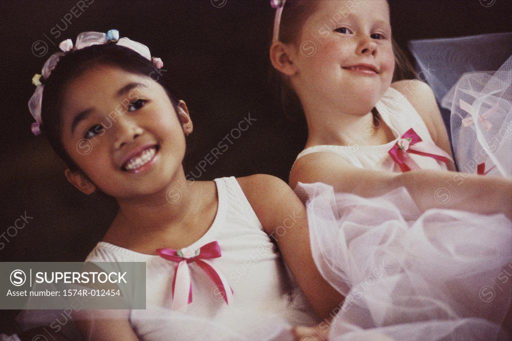 Stock Photo: 1574R-012454 Close-up of two ballet dancers smiling