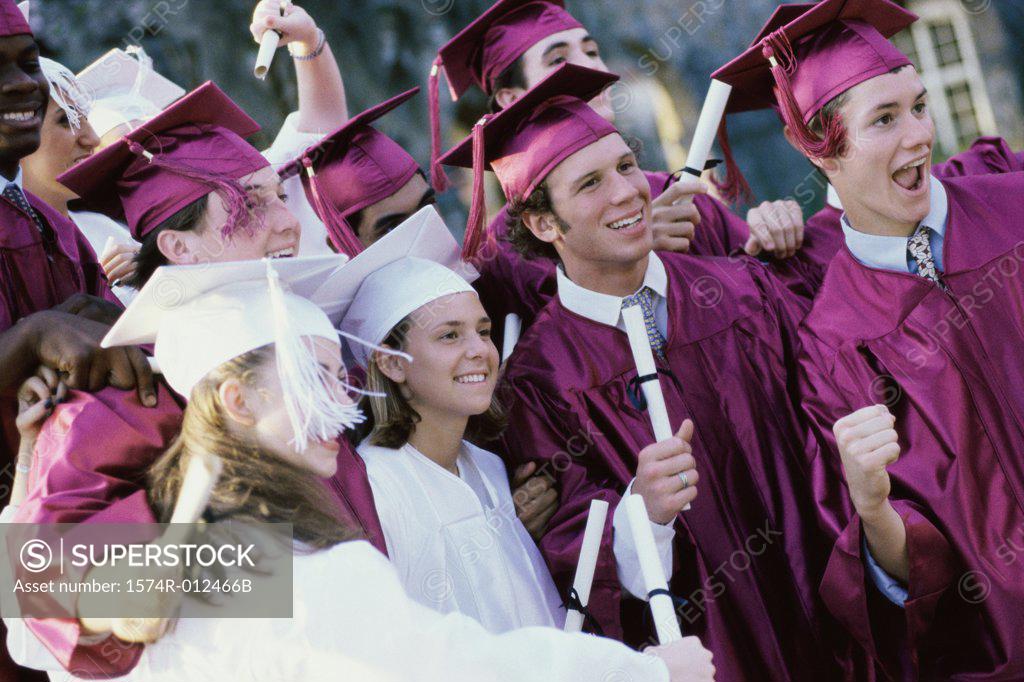 Stock Photo: 1574R-012466B Group of teenage graduates celebrating