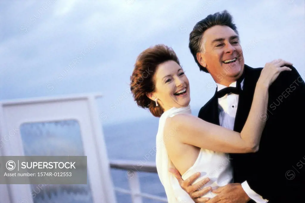Close-up of a mature couple dancing on the deck of a cruise ship