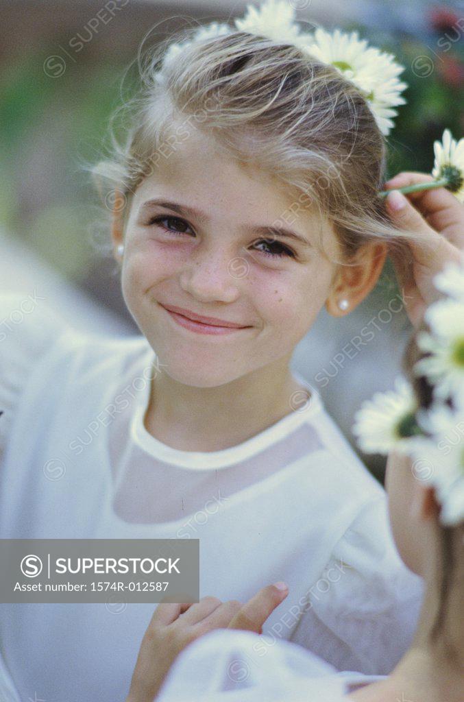 Stock Photo: 1574R-012587 Portrait of a girl smiling