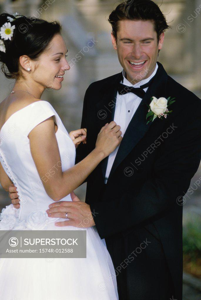 Stock Photo: 1574R-012588 Side profile of a newlywed couple smiling