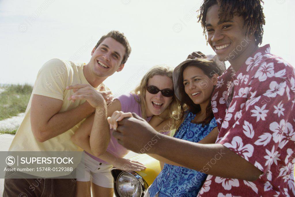 Stock Photo: 1574R-012938B Close-up of four teenagers smiling
