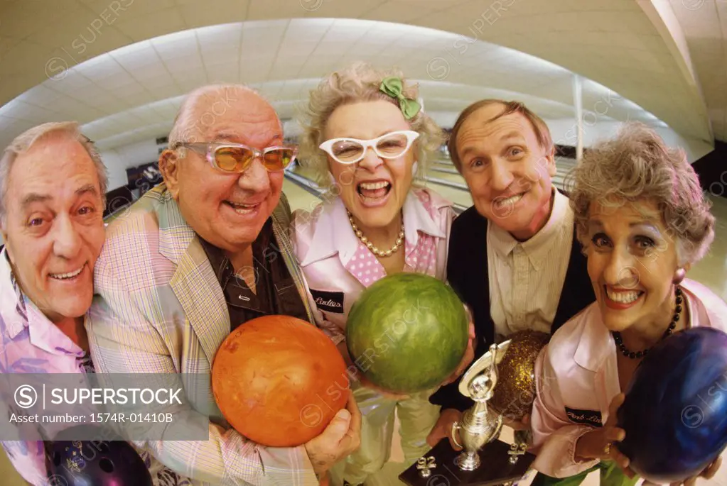 Portrait of a bowling team in a bowling alley