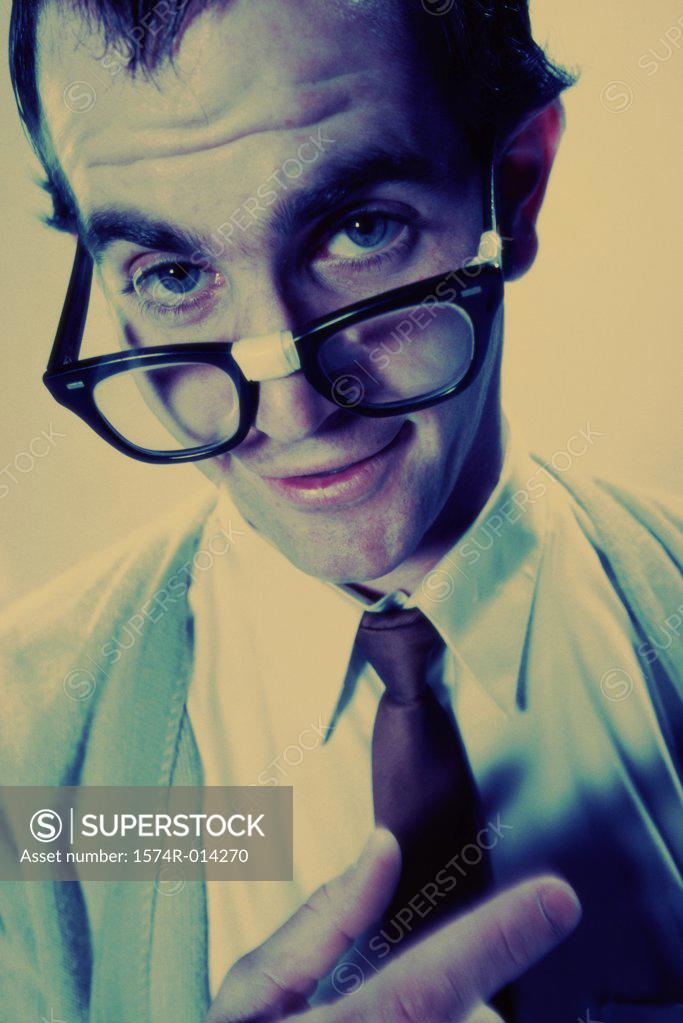 Stock Photo: 1574R-014270 Portrait of a young man wearing eyeglasses