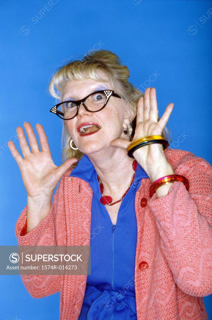 Stock Photo: 1574R-014273 Portrait of a senior woman gesturing