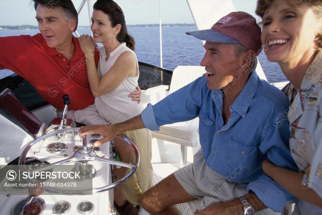 Stock Photo: 1574R-01437B Two couples on a boat