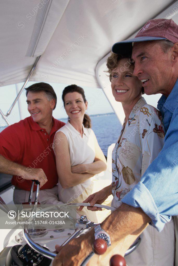 Stock Photo: 1574R-01438A Two couples on a boat