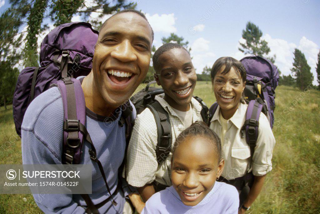 Stock Photo: 1574R-014522F Parents hiking with their son and daughter