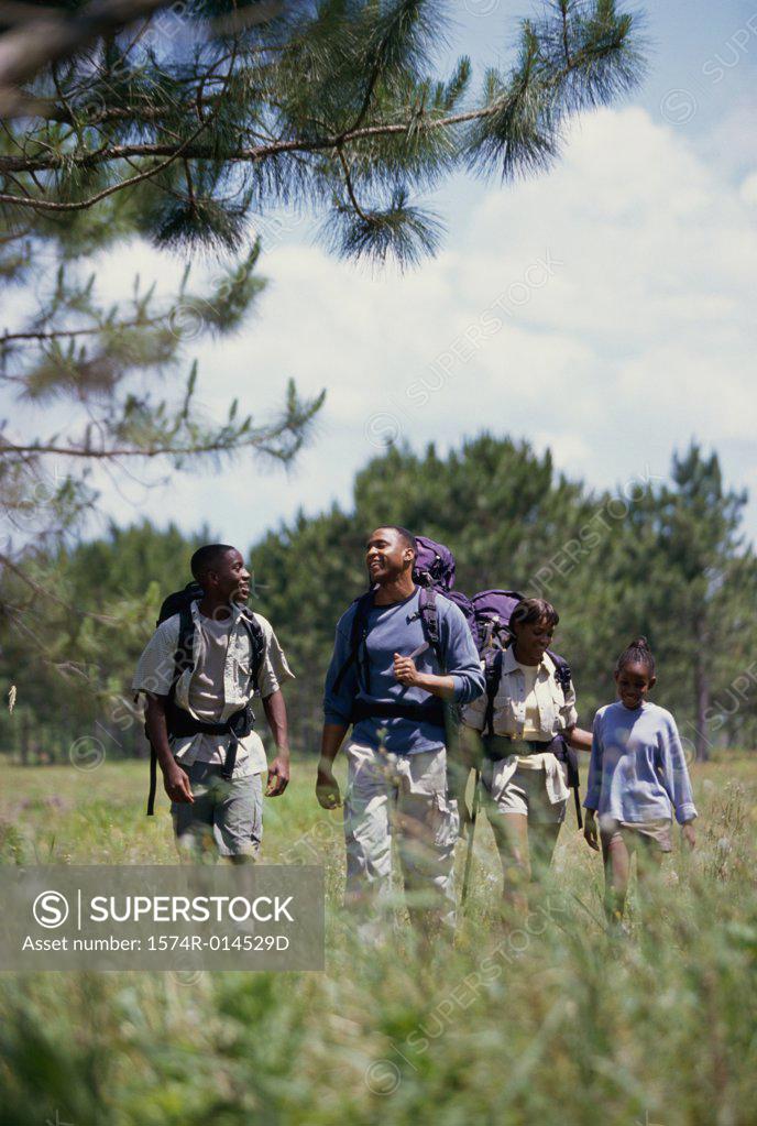 Stock Photo: 1574R-014529D Parents hiking with their son and daughter
