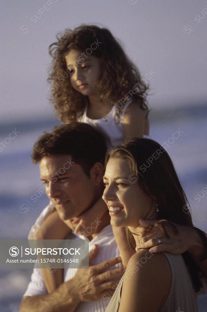 Stock Photo: 1574R-014654B Portrait of a young couple with their daughter