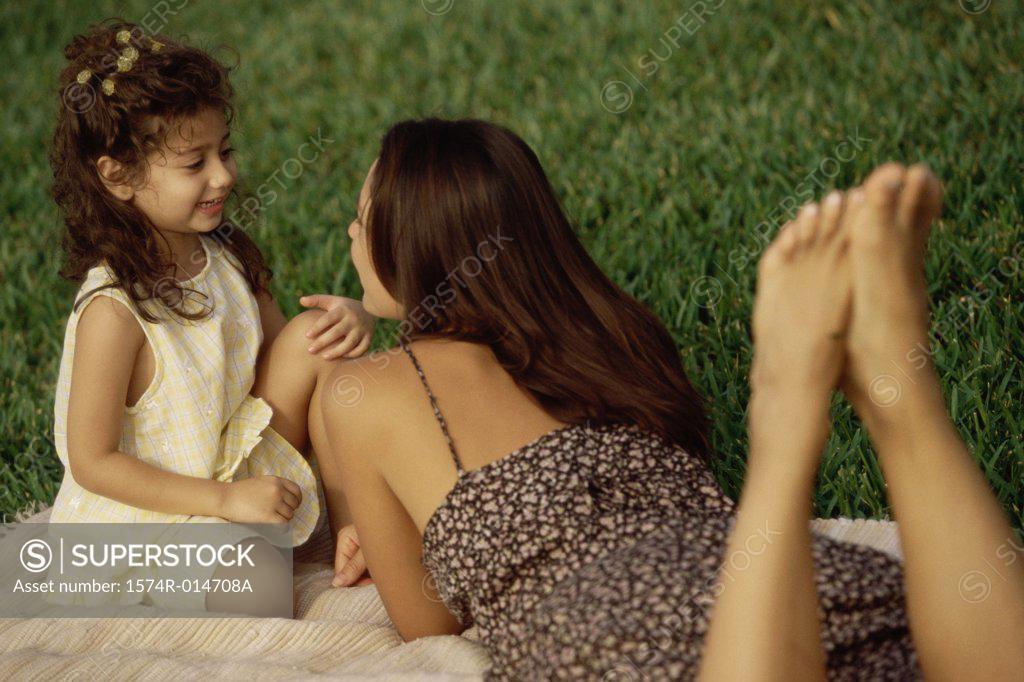 Stock Photo: 1574R-014708A Side profile of a daughter sitting with her mother in a park