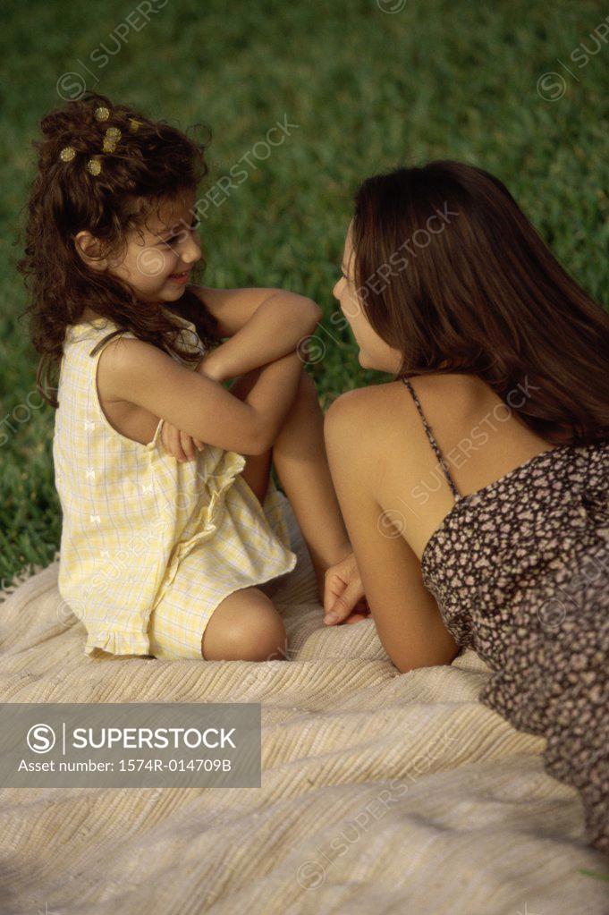Stock Photo: 1574R-014709B High angle view of a mother talking to her daughter