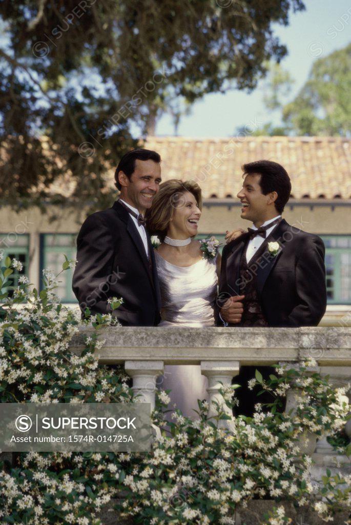 Stock Photo: 1574R-014725A Groom standing with his parents