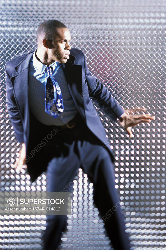 Stock Photo: 1574R-014812 Businessman looking scared