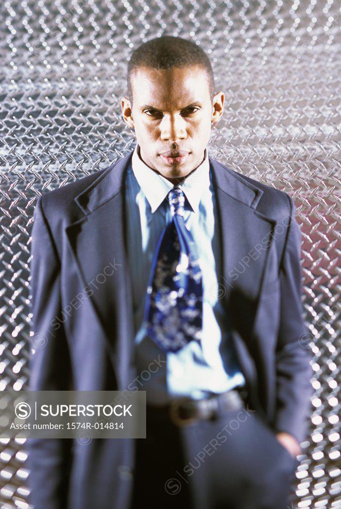 Stock Photo: 1574R-014814 Portrait of a businessman looking serious
