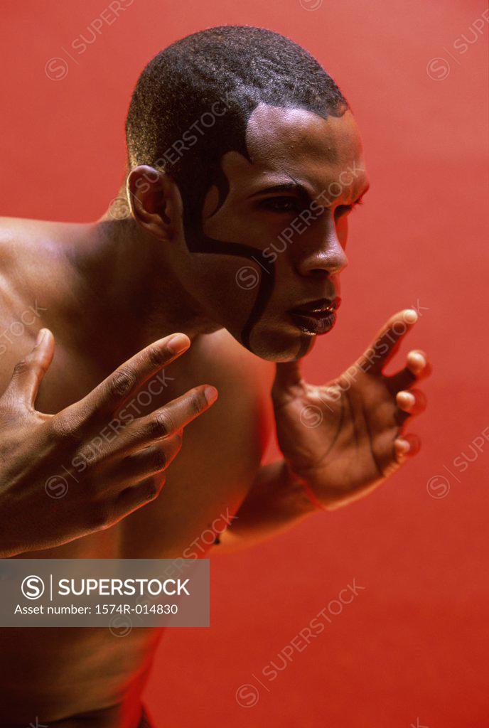 Stock Photo: 1574R-014830 Close-up of a young man looking serious