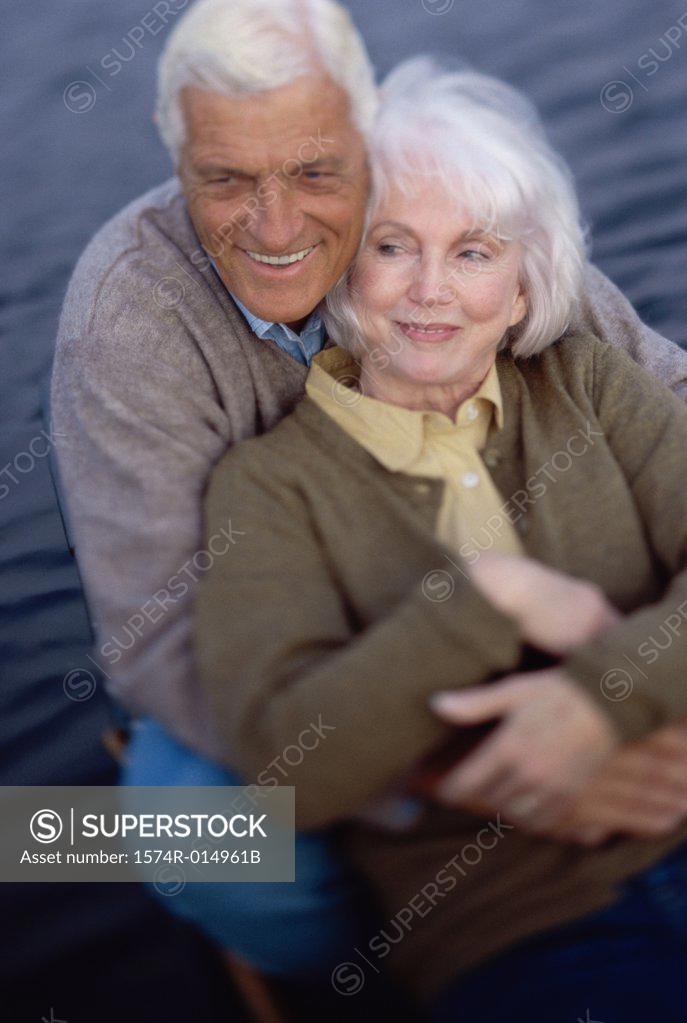 Stock Photo: 1574R-014961B Senior couple embracing each other