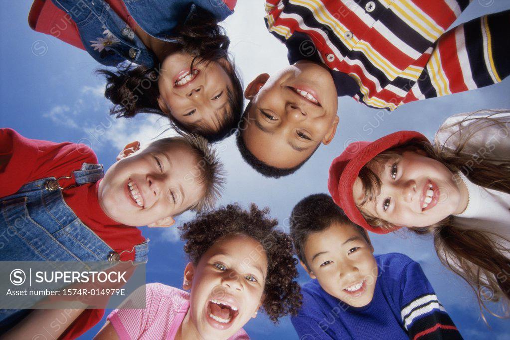Stock Photo: 1574R-014979E Portrait of a group of children in a huddle