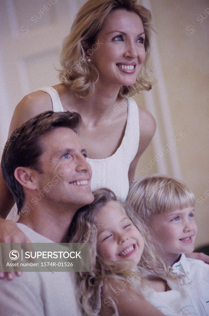 Stock Photo: 1574R-01526 Parents and their children looking ahead