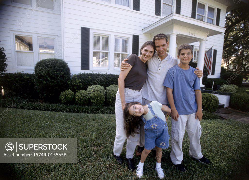 Stock Photo: 1574R-015565B Portrait of parents standing with their son and daughter