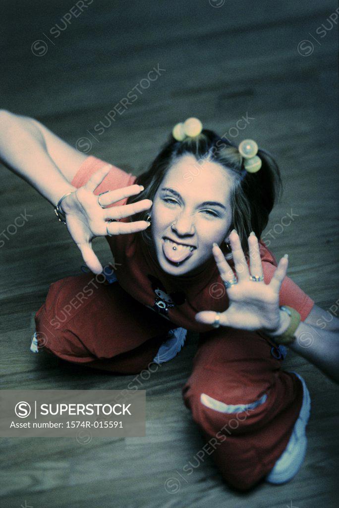 Stock Photo: 1574R-015591 Portrait of a teenage girl dancing