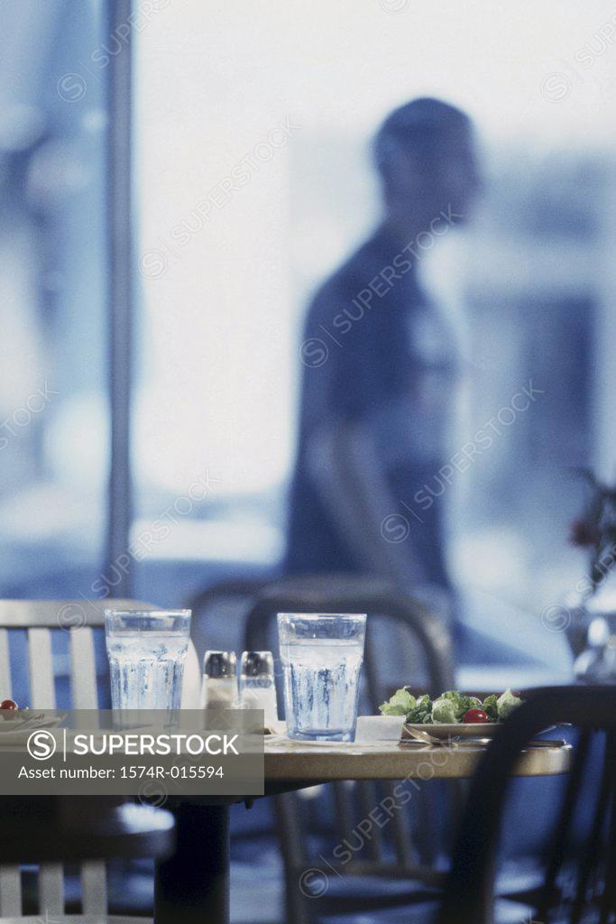 Stock Photo: 1574R-015594 Glasses on a table in a restaurant