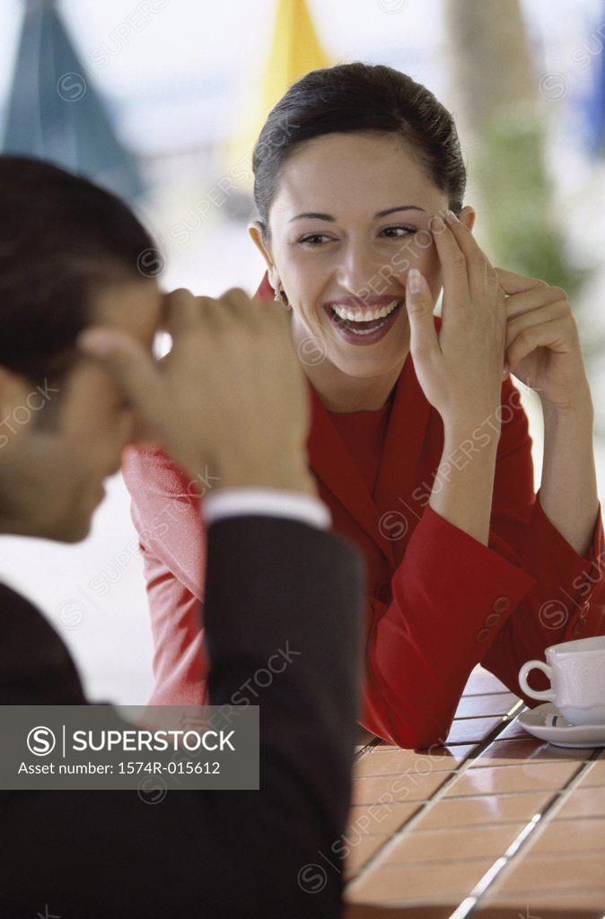 Stock Photo: 1574R-015612 Close-up of a businessman and a businesswoman smiling