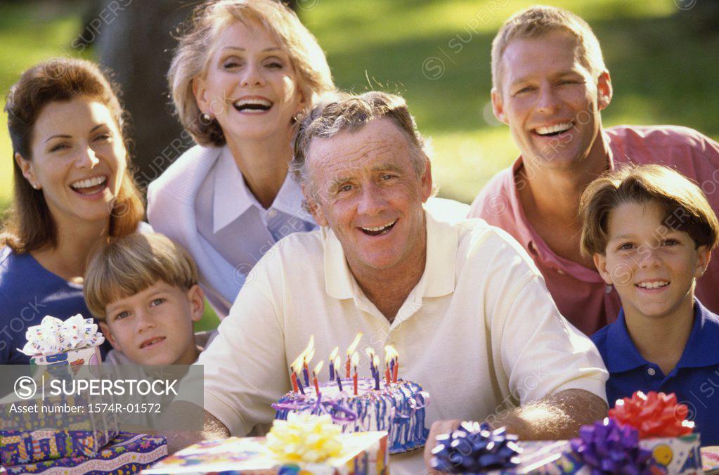 Stock Photo: 1574R-01572 Portrait of a family celebrating a birthday outdoors