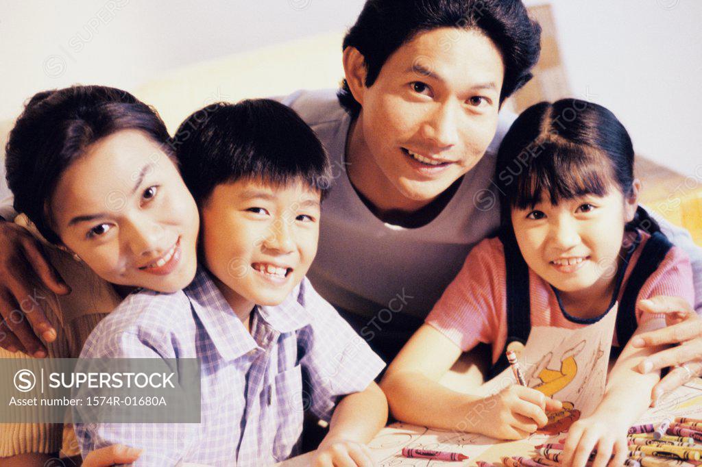 Stock Photo: 1574R-01680A Portrait of a couple with their son and daughter