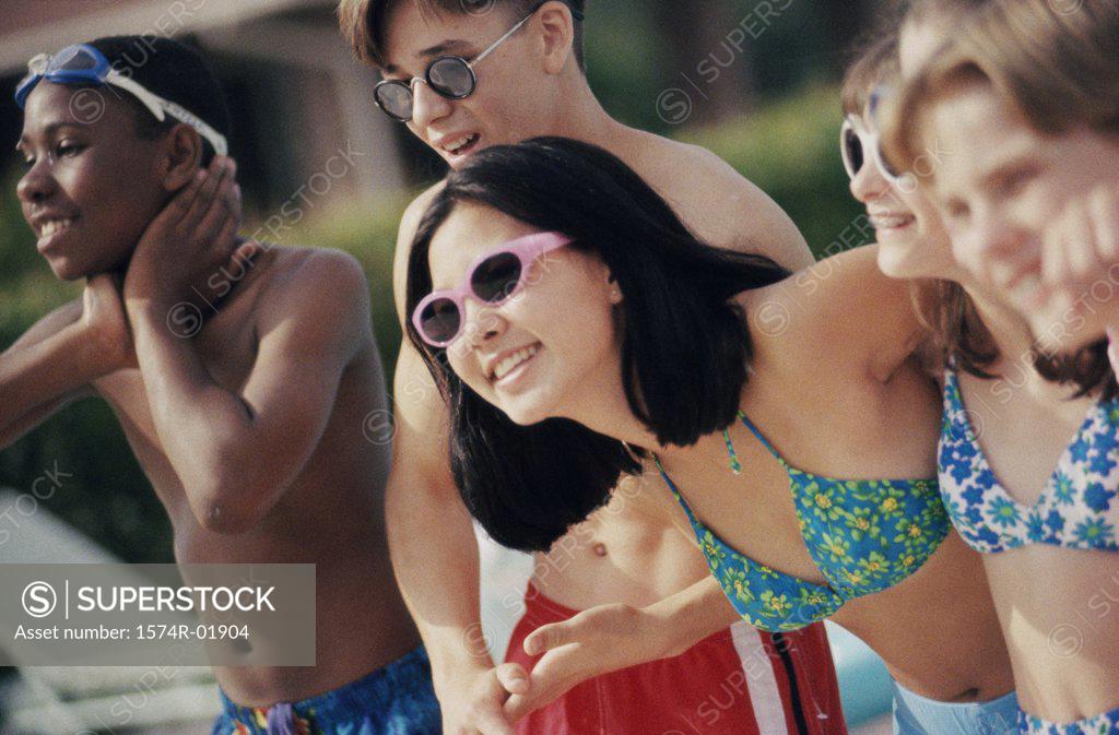 Stock Photo: 1574R-01904 Group of teenagers on the beach