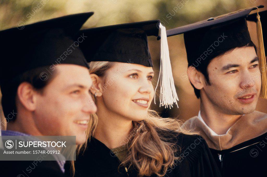 Stock Photo: 1574R-01912 Close-up of teenagers in graduation outfits
