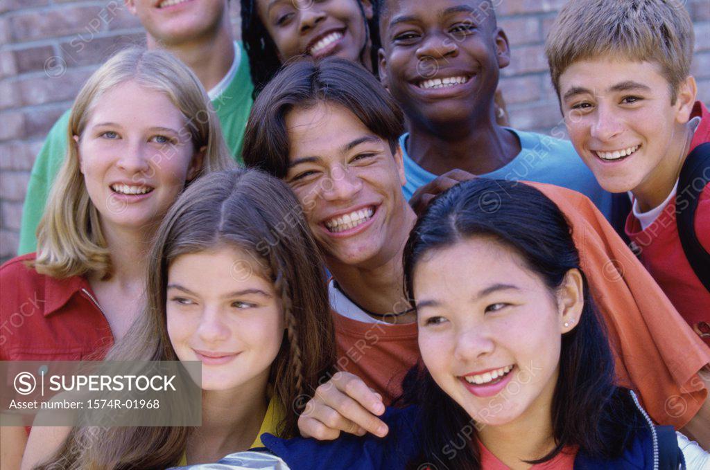 Stock Photo: 1574R-01968 Portrait of a group of teenagers posing
