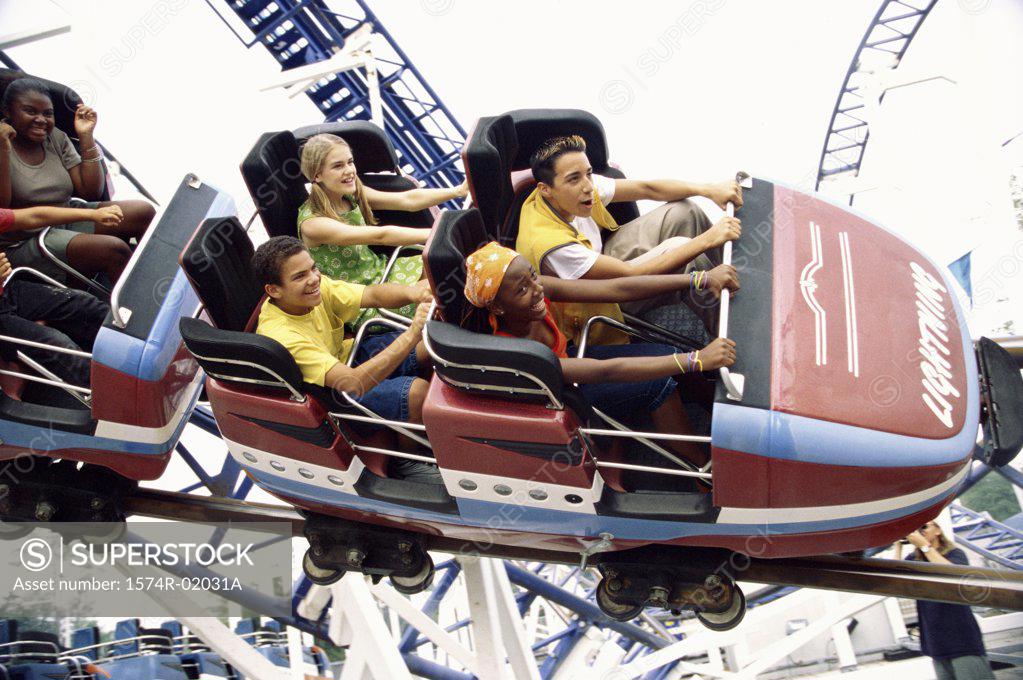 Stock Photo: 1574R-02031A High angle view of teenage boys and girls on a roller coaster ride