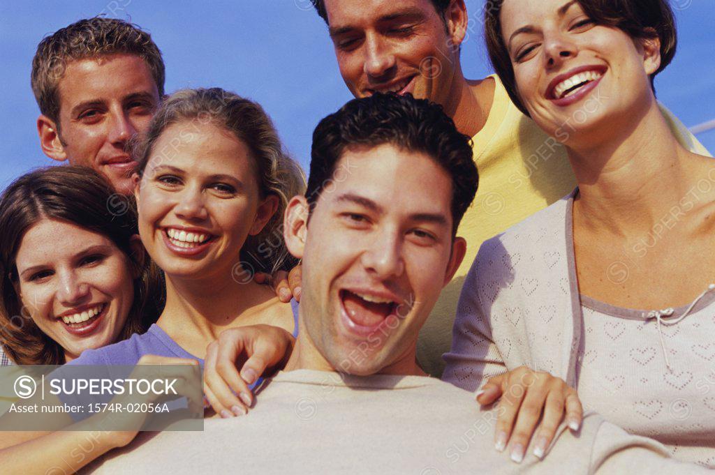 Stock Photo: 1574R-02056A Portrait of group of young people smiling