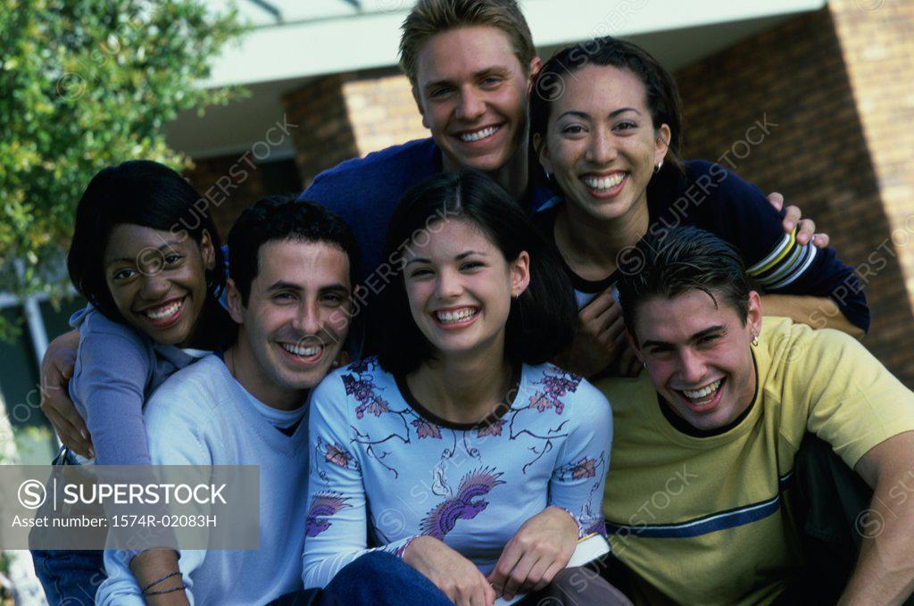 Stock Photo: 1574R-02083H Portrait of a group of teenagers smiling