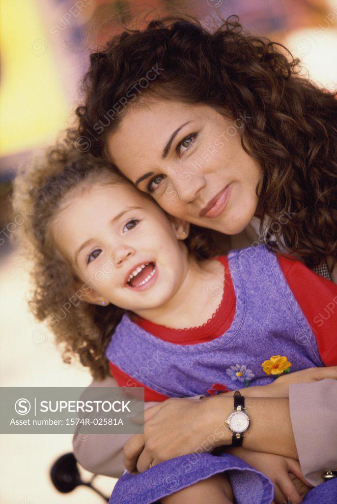 Stock Photo: 1574R-02581A Close-up of a mother hugging her daughter