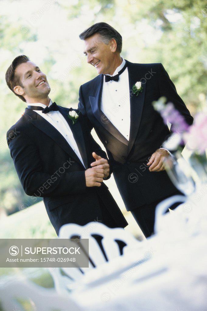 Stock Photo: 1574R-02694B Newlywed young man with his father