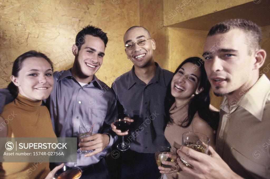 Stock Photo: 1574R-02756A Portrait of a group of young people in a bar