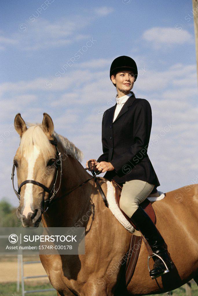Stock Photo: 1574R-03017B Jockey sitting on a horse