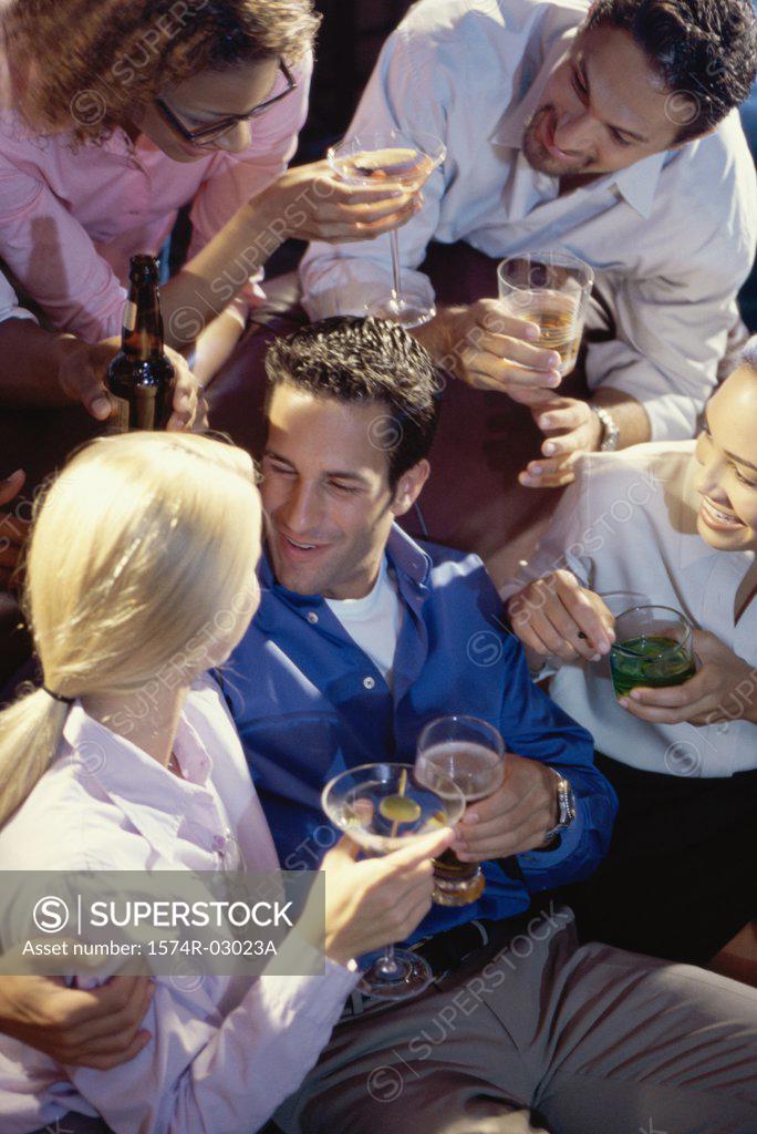 Stock Photo: 1574R-03023A Group of young people in a bar