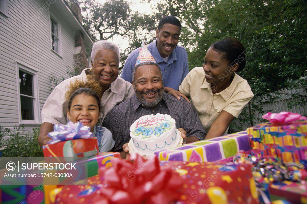 Stock Photo: 1574R-03030A Portrait of a family at a birthday party