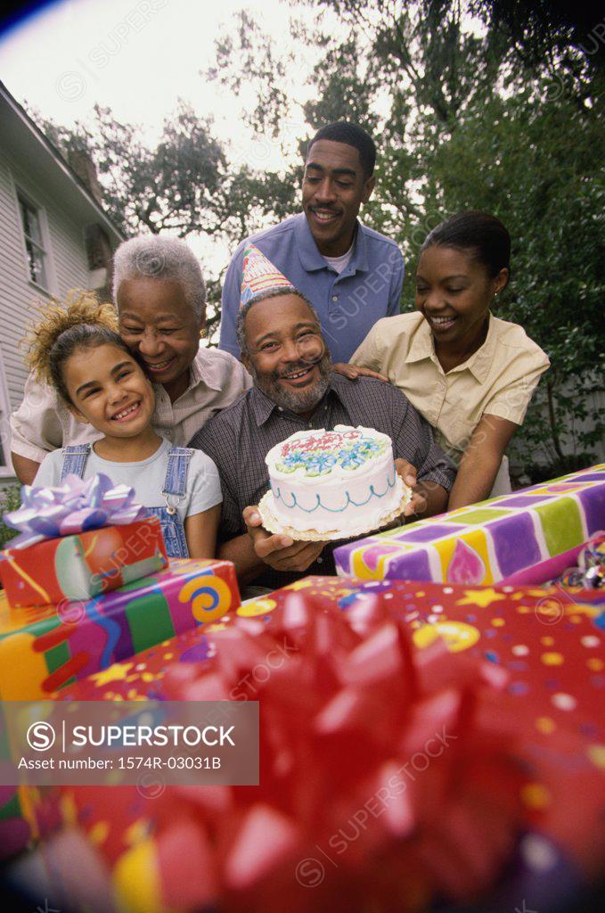 Stock Photo: 1574R-03031B Portrait of a family at a birthday party