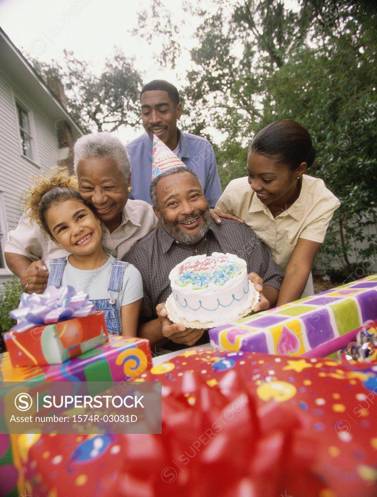 Stock Photo: 1574R-03031D Portrait of a family at a birthday party