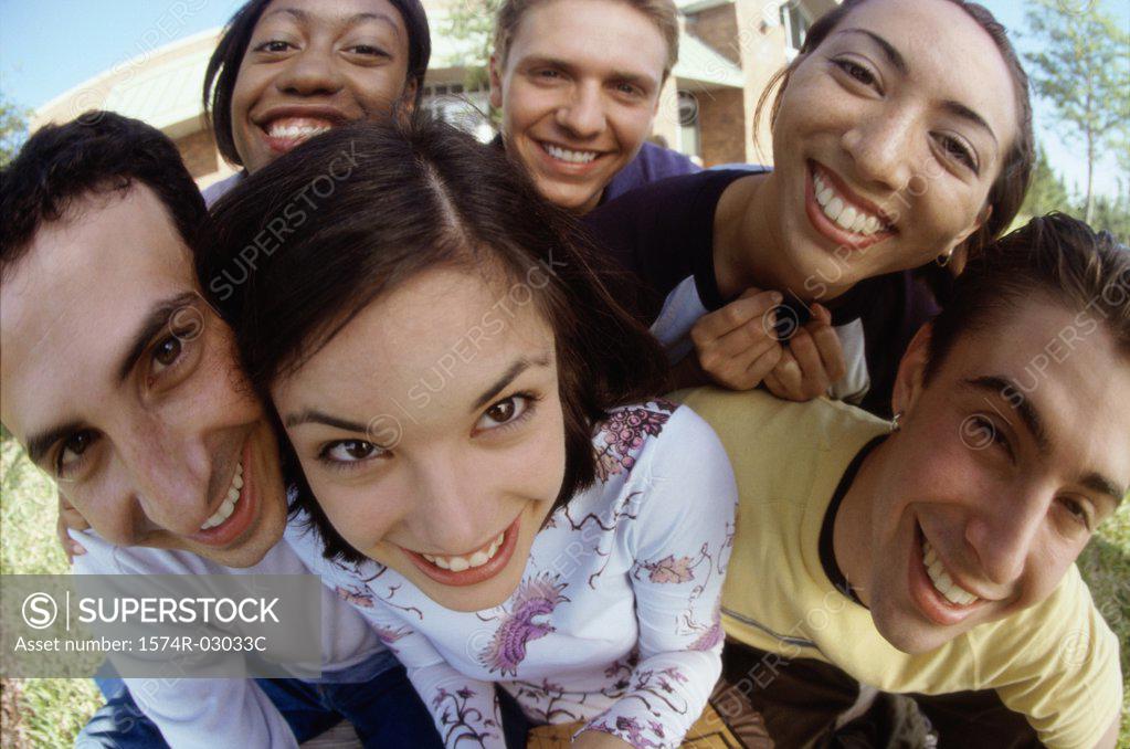Stock Photo: 1574R-03033C Portrait of a group of teenagers smiling